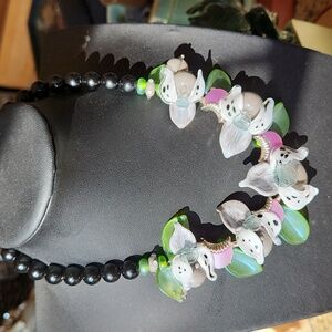 Glass and vintage thermoset necklace in grey, pink and green.